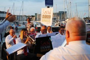 Soundhouse Brass performing in Sutton Harbour