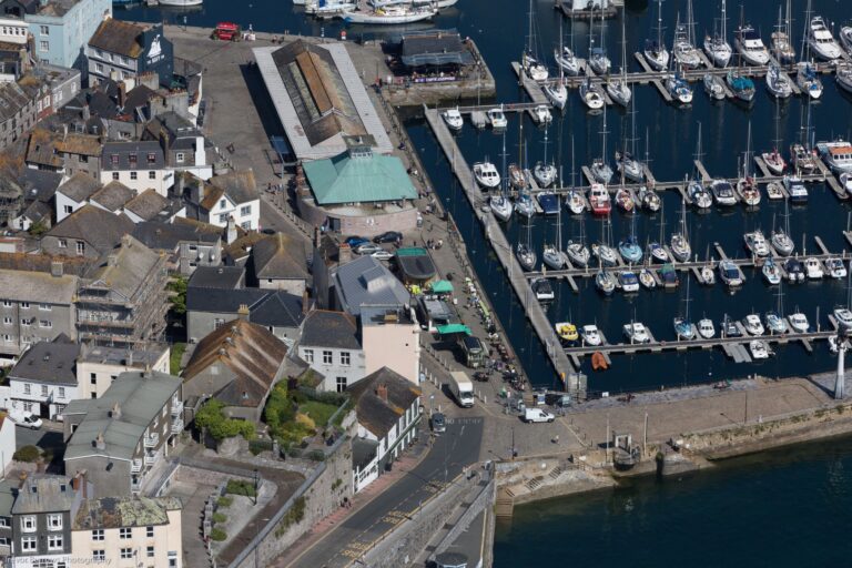 Sheltered walk-ashore berths behind the lock gates at Sutton Harbour Marina, Plymouth Barbican